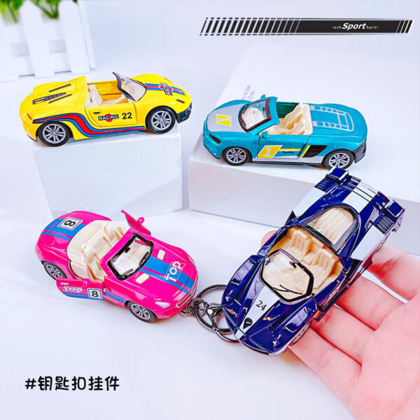 oly-019f4e0f214c69f414d53182e95e4ffb Wholesale Alloy back sports car key chain pendant graffiti simulation racing model student schoolbag pendant small gift