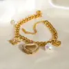 Wholesale 304 Stainless Steel Heart Shape Bow Knot PVD Coated Zircon 18K Real Gold Plated Real Gold Plated Simple Style Classic Style Waterproof Non Tarnish Pearl Inlay Cuban Link Chain Curb Chain Paperclip Chain Belcher Chain Multi Charms Bracelet