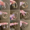 Wholesale Fashion Geometric Heart Shape Metal Inlay Artificial Pearls Rhinestones Women's Hoop Earrings 1 Pair