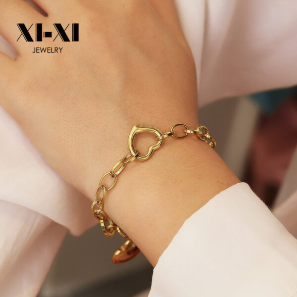 Wholesale European and American INS style stainless steel bracelet plated 18k gold heart shaped bracelet love heart pendant titanium steel bracelet for women