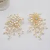 Wholesale 1 Pair IG Style Exaggerated Flower Pearl Plating Alloy Drop Earrings