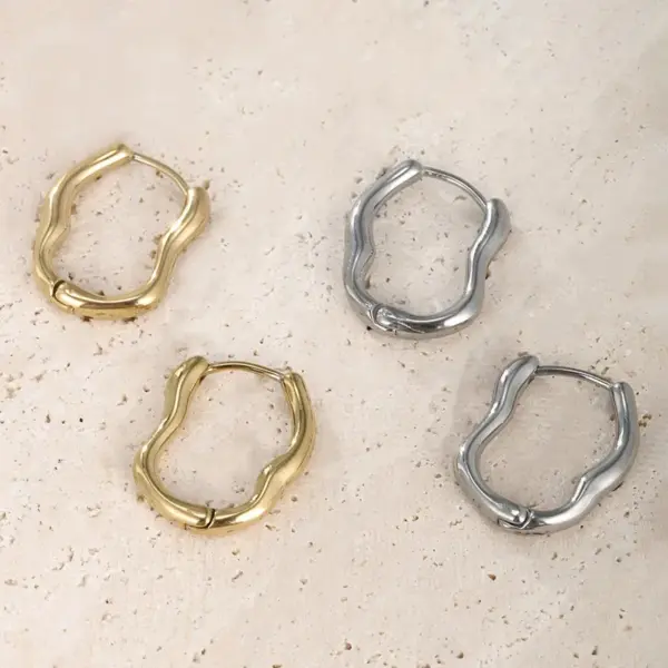 Wholesale 1 Pair XUPING Simple Style Irregular Irregular 304 Stainless Steel 18K Gold Plated Raw Steel Earrings