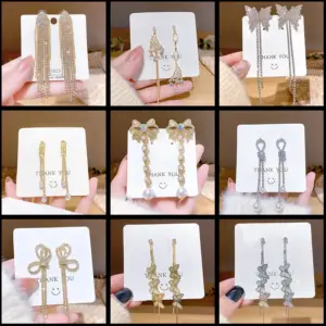 Wholesale Fashion Tassel Butterfly Bow Knot Copper Inlay Artificial Pearls Rhinestones Earrings 1 Pair