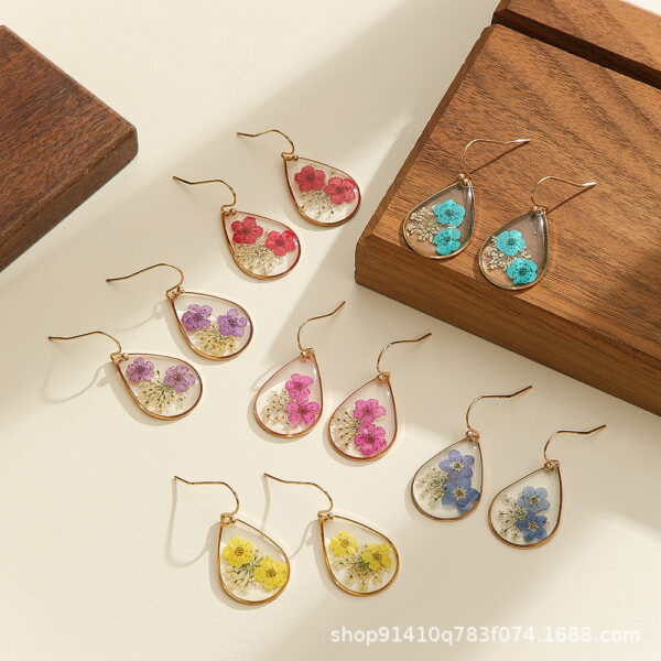 oly-0480d34f2e625390ddbeb346b63ad00a Wholesale New Transparent Camellia Dried Flower Creative Water Drop Flower Earrings Design Earrings