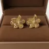 Wholesale Water Plated Imitation Gold Style Three-Dimensional Flower Plumeria Shape Earrings 304 Stainless Steel Women's Earrings
