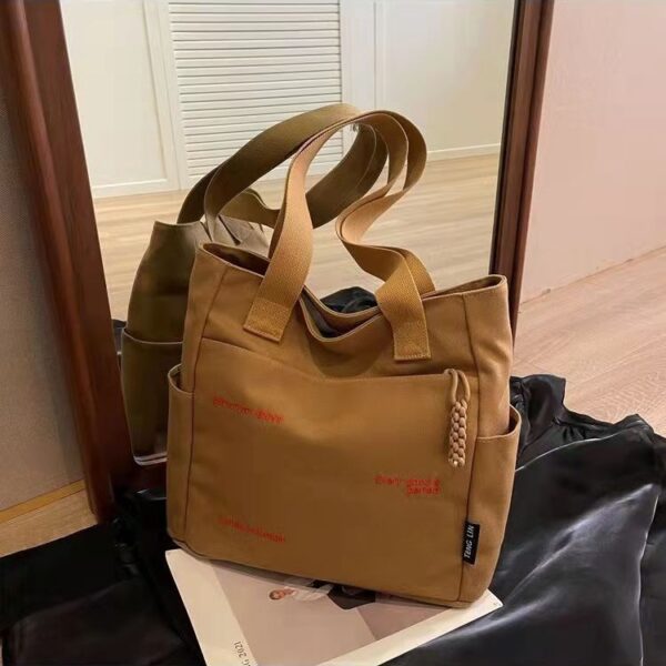 Wholesale Canvas bag for women ins Mori all-match shoulder bag large capacity book loading student class commuter bag portable cloth bag