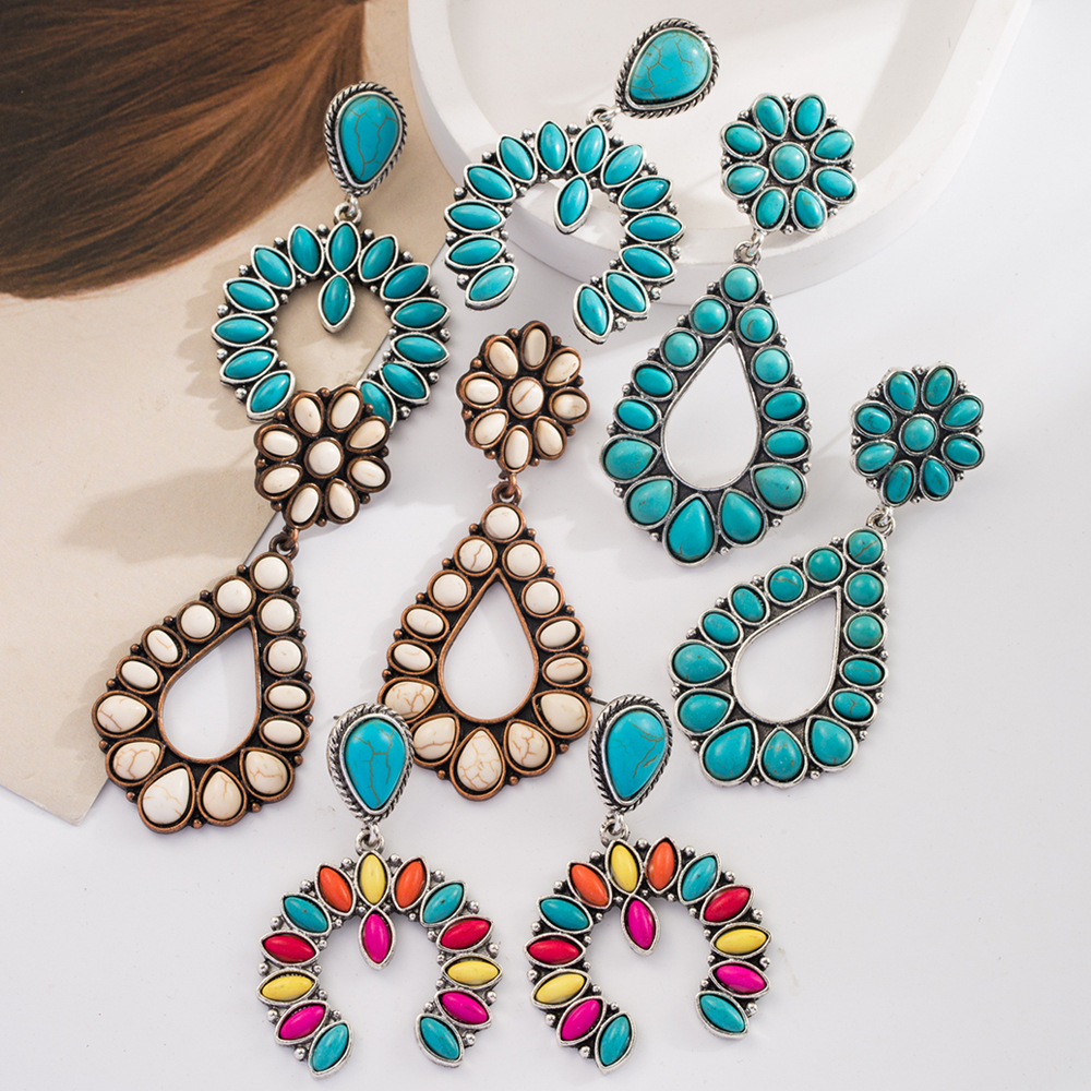 Wholesale European and American cross-border Bohemian holiday style inlaid turquoise earrings fashion creative exaerated earrings Amazon hot sale