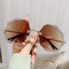 oly-05c3eeeb27f353e7c9d8eff5731b1f42 Wholesale lygon Shaped Diamond Trimmed Frameless Flower Wave Sunglasses Retro Sunglasses