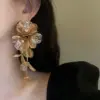 Wholesale 1 Pair Elegant Exaggerated Flower Inlay Copper Artificial Rhinestones Drop Earrings