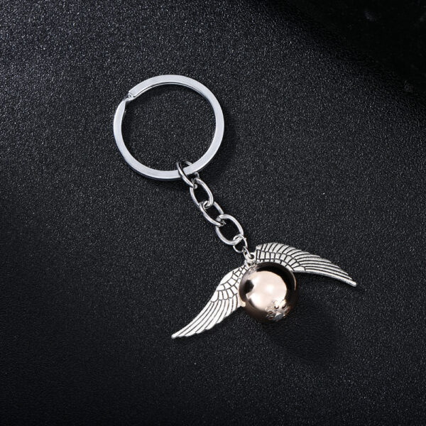 Wholesale European and American Cross-Border Hot Selling Fashion Deathly Saints Golden Snitch Keychain Fashion Alloy Car Key Chain Pendant