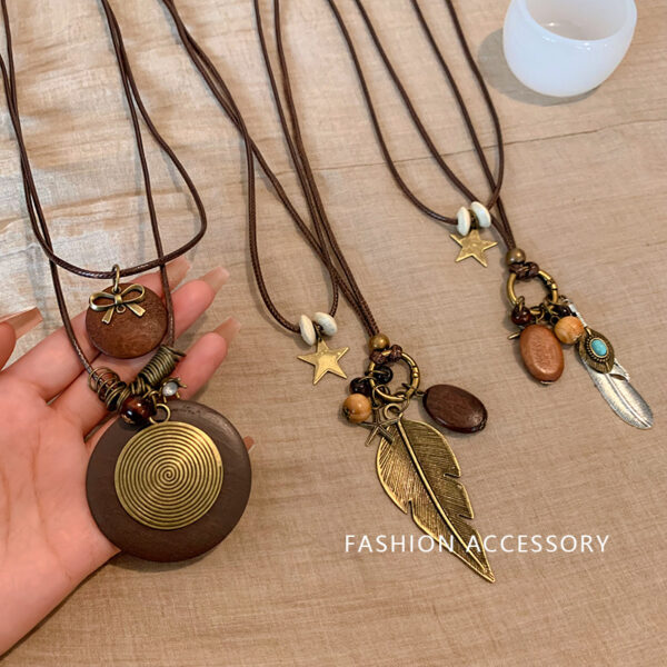 oly-0811b85acafbd8e668d6455124f33b2f Wholesale Zen Retro Feather Necklace Women's Ethnic Style Overlapping Beaded Clavicle Chain Long Bohemian Matching
