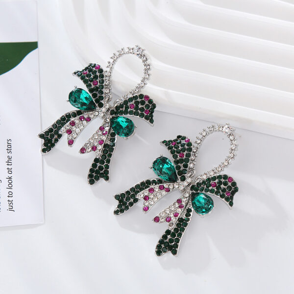 Wholesale European and American new fashion high-end sense full diamond bow silver needle earrings women's exquisite elegant colored diamond ear jewelry