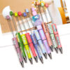 oly-09bf6b40f8372daf57a1c81a052f8d46 Wholesale Beadable pens, colorful English letter printed beads