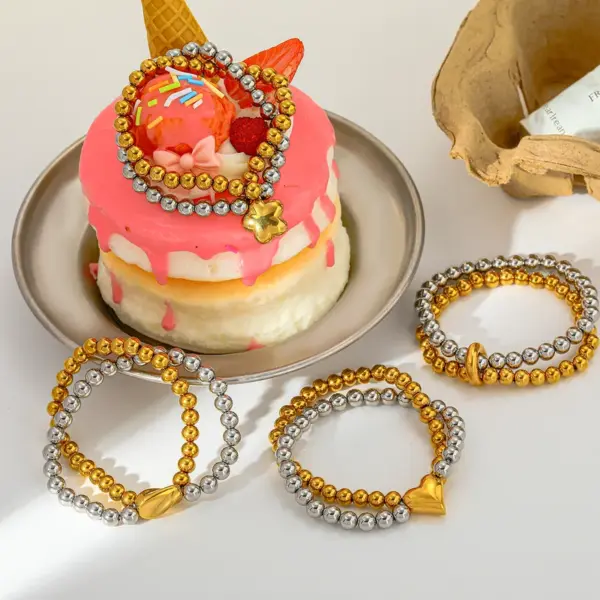 Wholesale Luxurious Double Layer Heart Shaped Pendant Beaded Bracelet 18K Gold Plated Stainless Steel Elastic Line For Women Casual Classic Style