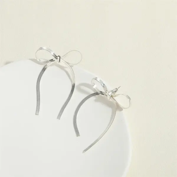 Wholesale 1 Pair Vintage Style Simple Style Commute Bow Knot Copper 14K Gold Plated Drop Earrings