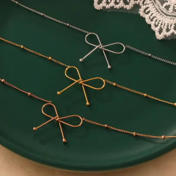 Wholesale PVD Coated Real Gold Plated 18K Gold Bow Knot 304 Stainless Steel Casual Simple Style Commute Waterproof Non Tarnish Bracelets Necklace