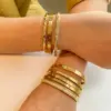 Wholesale PVD Coated 18K Gold Real Gold Plated Round Stainless Steel Simple Style Waterproof Non Tarnish Bangle