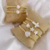 Wholesale Retro Cross Star Heart Shape Pearl Copper Bracelets In Bulk