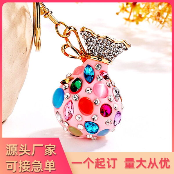 Wholesale Diamond Bag Couple Car Keychain Cute Cat's Eye Money Bag Key Chain Accessories Women's Bag Pendant Small Jewelry