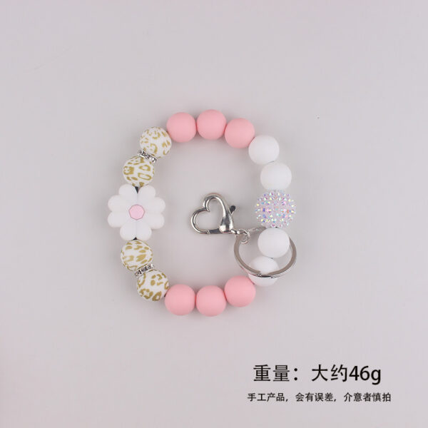 oly-0d2a4eede7a78e4f78351bd29d4de63d Wholesale Spot Amazon Silicone Food Grade Silicone Bead Bracelet Spring and Summer Daisy Wrist Keychain Pendant Bracelet