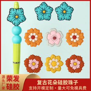 oly-0d5493d565ab1792000a192dde977d91 Wholesale New silicone flower bead DIY bracelet material kit, featuring cartoon children's beads and straight-hole silicone beads.
