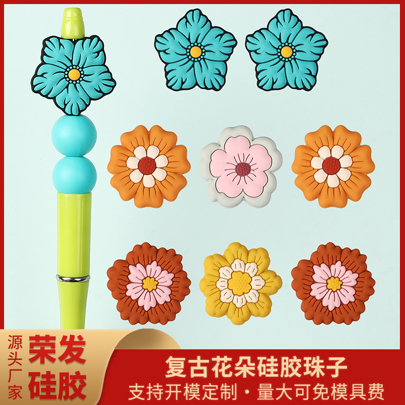 Wholesale New silicone flower bead DIY bracelet material kit, featuring cartoon chilen's beads and straight-hole silicone beads.