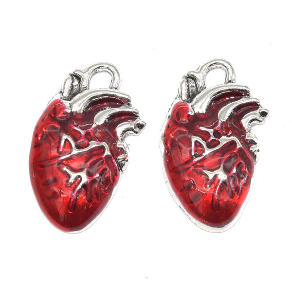 oly-0d8c31cdf5c6e82310e69a6ae841e9cb Wholesale Gothic style simulation sword axe heart organ dripping Doll Accessories