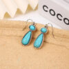 Wholesale European and American creative turquoise earrings exaggerated new ancient silver turquoise earrings factory direct supply