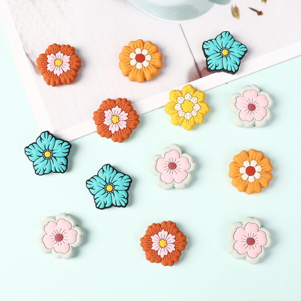 Wholesale New silicone flower bead DIY bracelet material kit, featuring cartoon children's beads and straight-hole silicone beads.