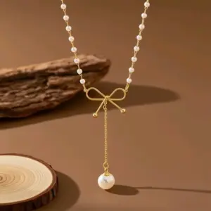 X0410-Pearl Bow-Necklace- Gold