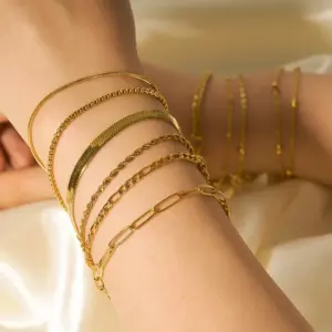 Wholesale 304 Stainless Steel Solid Color PVD Coated Real Gold Plated 18K Gold IG Style Modern Style Waterproof Non Tarnish Cuban Link Chain Curb Chain Figaro Chain Lobster Trigger Clasp Closure Gold Bracelets