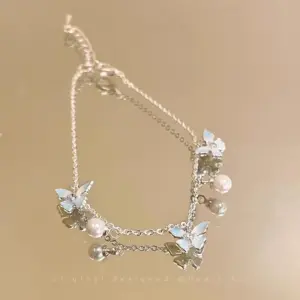 S699 Pearl-Mint Blue Butterfly Pearl Bracelet
