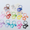 Wholesale Acrylic colorful five-pointed star key ring earphone case bag pendant paint card ring bell decorative key chain