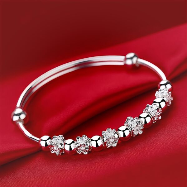 Wholesale Bloom plum rotating bead bracelet push-pull opening happy Bloom plum bracelet online celebrity fresh young Chinese Valentine's Day gift