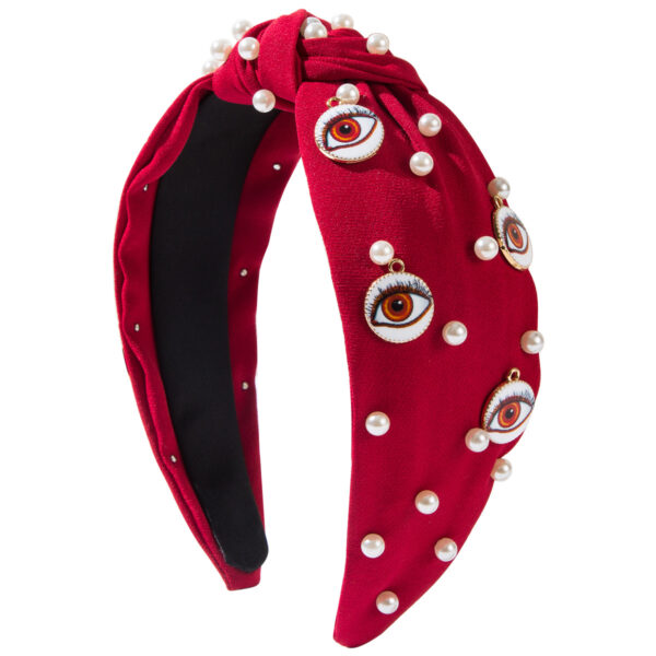 Wholesale Korean style elegant fabric headband studded with pearls, round evil eye design, fashionable wide-brimmed knotted hair accessory for women.