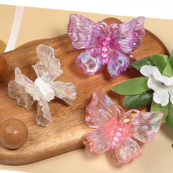 oly-0f07ea2e58e3471a7a323c781761782e Wholesale 3D iridescent gradient butterfly through-hole beaded resin butterfly hollow DIY jewelry wing accessories