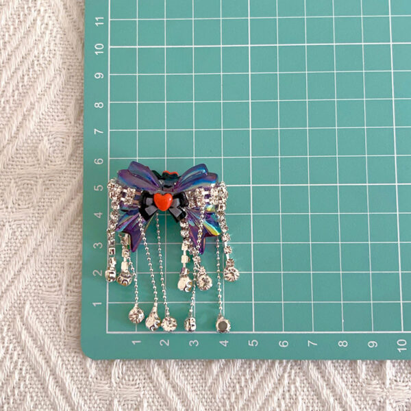 oly-0f5c8e2f895ac356b01a06256857225f Wholesale Bow Tassel Loose Beads