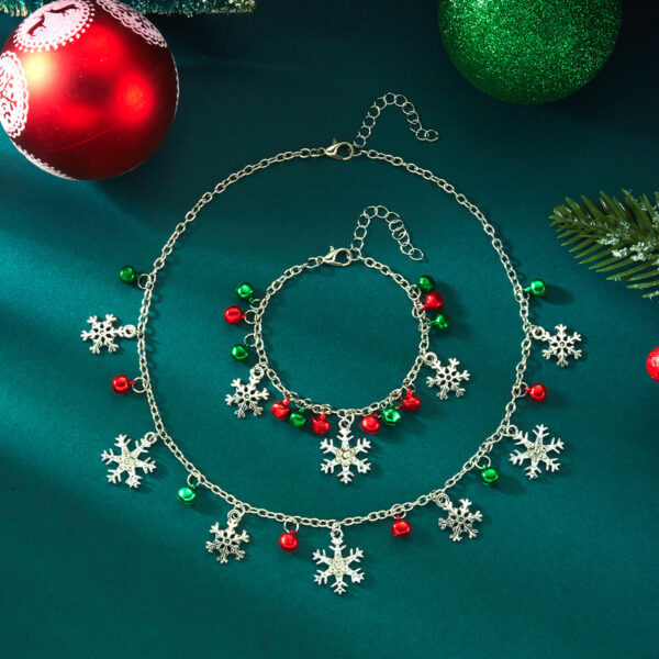 Wholesale New European and American cross-border Christmas jewelry set for women, featuring colorful bells, rhinestone-encrusted snowflakes, and pendants.
