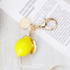 Wholesale New creative alloy rhinestone simulation fruit lemon car key chain bag pendant couple key chain gift