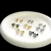 Wholesale 1 Piece Cute Simple Style Flower Plating Titanium Steel Ear Studs
