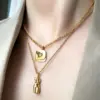 oly-10f8a5dd607306c8f083500be343215b Wholesale PVD Coated Real Gold Plated 18K Gold Heart 304 Stainless Steel Titanium Steel Waterproof Non Tarnish 304 Stainless Steel Titanium Steel Necklace
