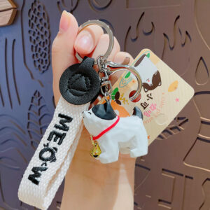 Wood carved bell kitten-black and white cat