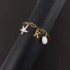 Wholesale Classic Summer Ocean Style Gold Stainless Steel Initial Bracelet Shell Starfish Pin Chain Ladies Bracelet Elegant Simple Design