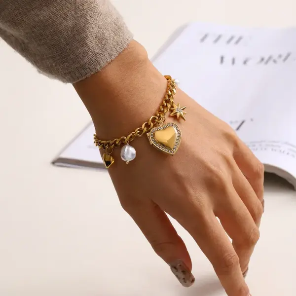 Wholesale 304 Stainless Steel Heart Shape Bow Knot PVD Coated Zircon 18K Real Gold Plated Real Gold Plated Simple Style Classic Style Waterproof Non Tarnish Pearl Inlay Cuban Link Chain Curb Chain Paperclip Chain Belcher Chain Multi Charms Bracelet