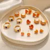 Wholesale 1 Pair Retro Sweet Triangle Devil's Eye Heart Shape Enamel Plating Inlay Copper Zircon 18k Gold Plated Ear Studs