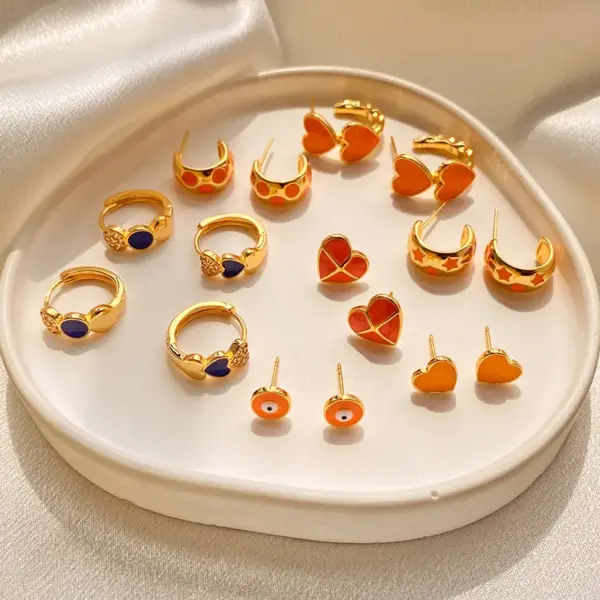 Wholesale 1 Pair Retro Sweet Triangle Devil's Eye Heart Shape Enamel Plating Inlay Copper Zircon 18k Gold Plated Ear Studs