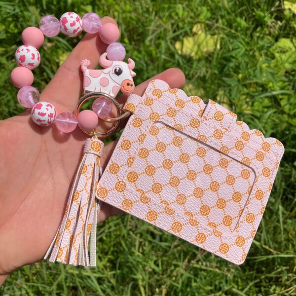 oly-13e7108e600c2ed3c944f791f3debff2 Wholesale Women's Printed PU Leather Coin Purse Wrist Keychain