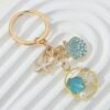 Wholesale Cross-border starfish shell keychain creative oil pearl keychain bag pendant girls pvc key chain