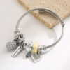 oly-14c9886064c4133bc0d119bf66933e31 Wholesale Stainless steel bracelet for women, fashionable and versatile, heart-shaped pendant, adjustable and colorfast.
