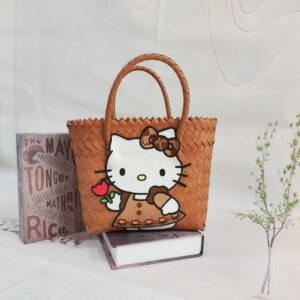 Brown hand basket with red flowers kt